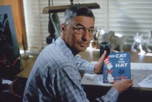 Theodor Seuss Geisel (1904-1991) with a copy of his book The Cat in the Hat.  (Gene Lester/Getty Images)